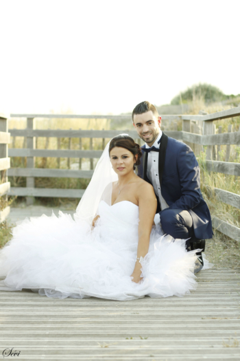 Photo mariage assis plage